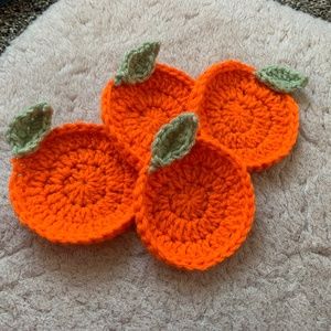 Handmade in coaster crochet orange.